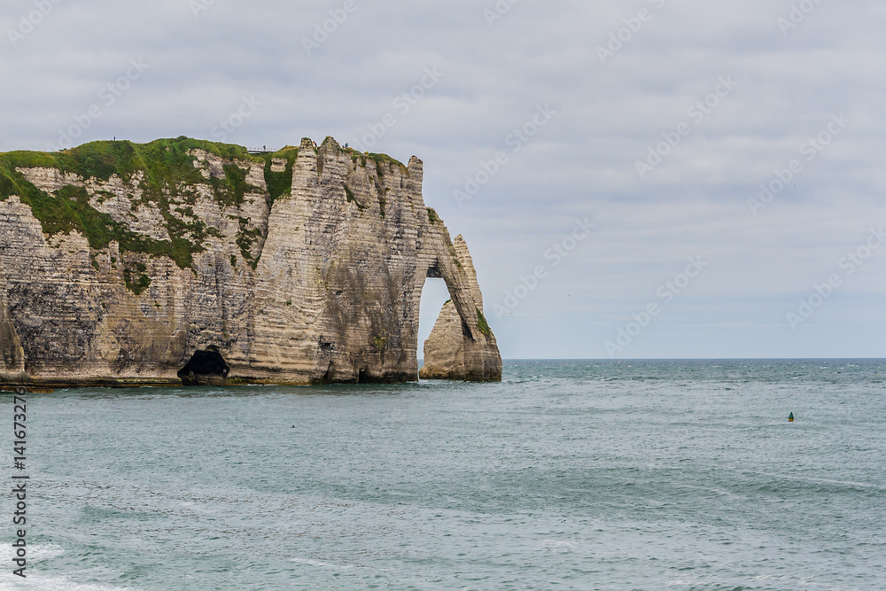Etretat - turquoise sea, alabaster cliff. Seine-Maritime, France Etretat - turquoise sea, alabaster cliff. Seine-Maritime, France