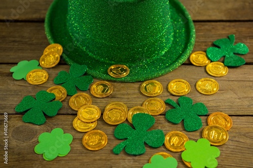 St Patricks Day leprechaun hat with gold chocolate gold coins photo