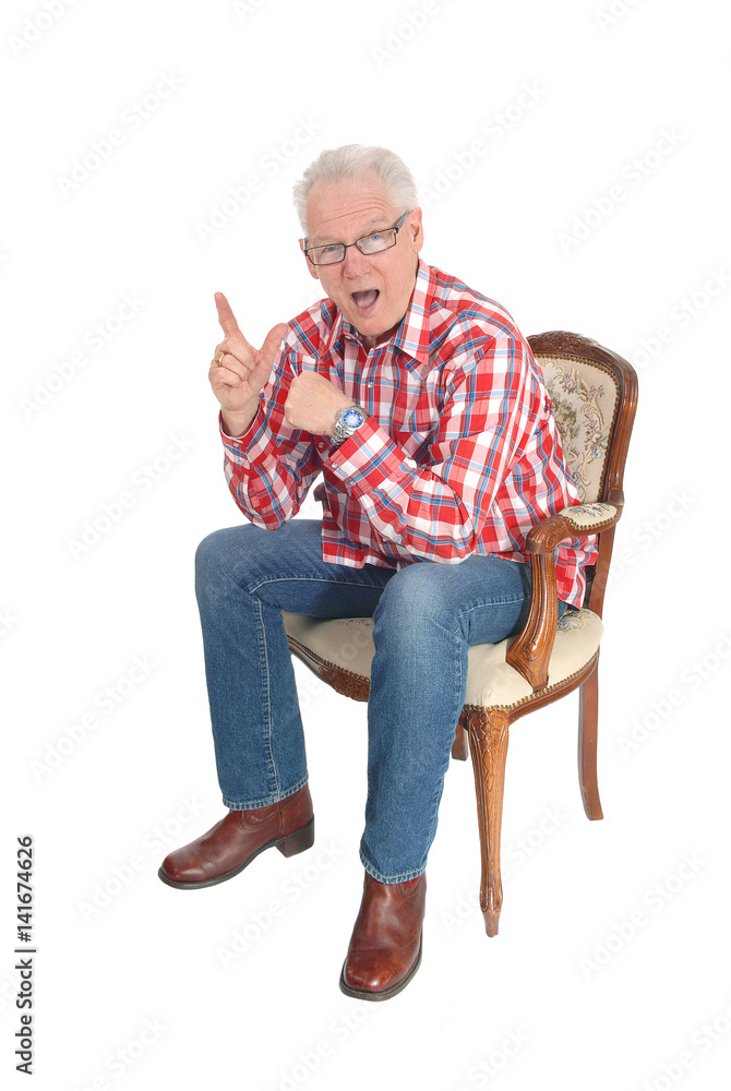 Senior man sitting surprised. Senior man sitting surprised.