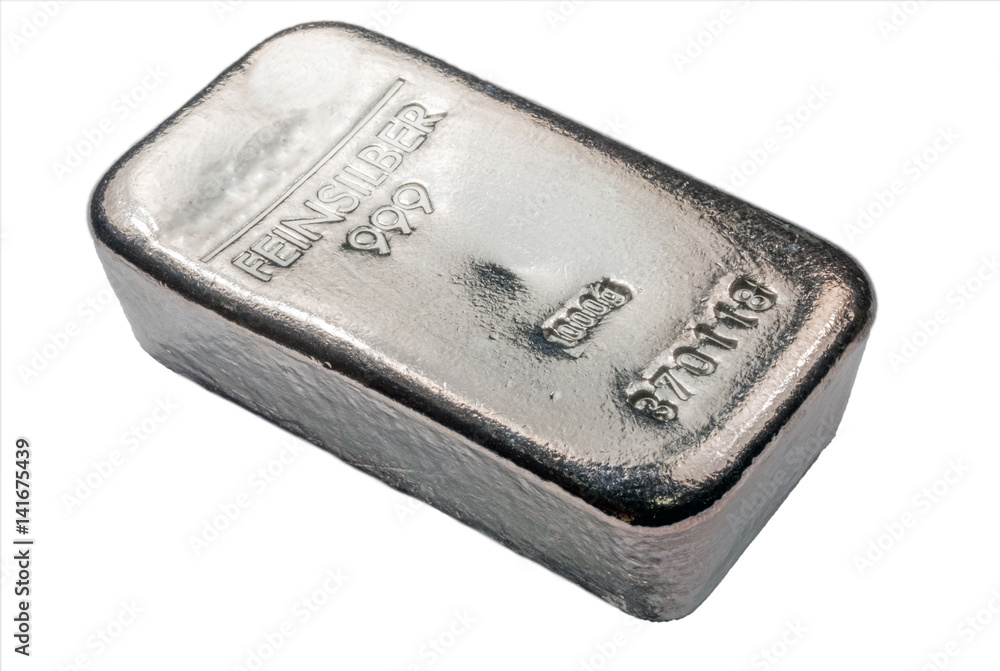 Cast silver bar isolated on white background. The texture of the surface of the silver ingot. Cast silver bar isolated on white background. The texture of the surface of the silver ingot.