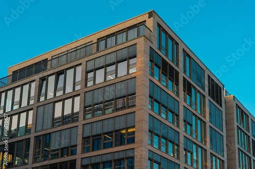 Condominum exterior with slanted windows