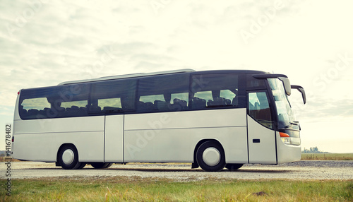 tour bus driving outdoors