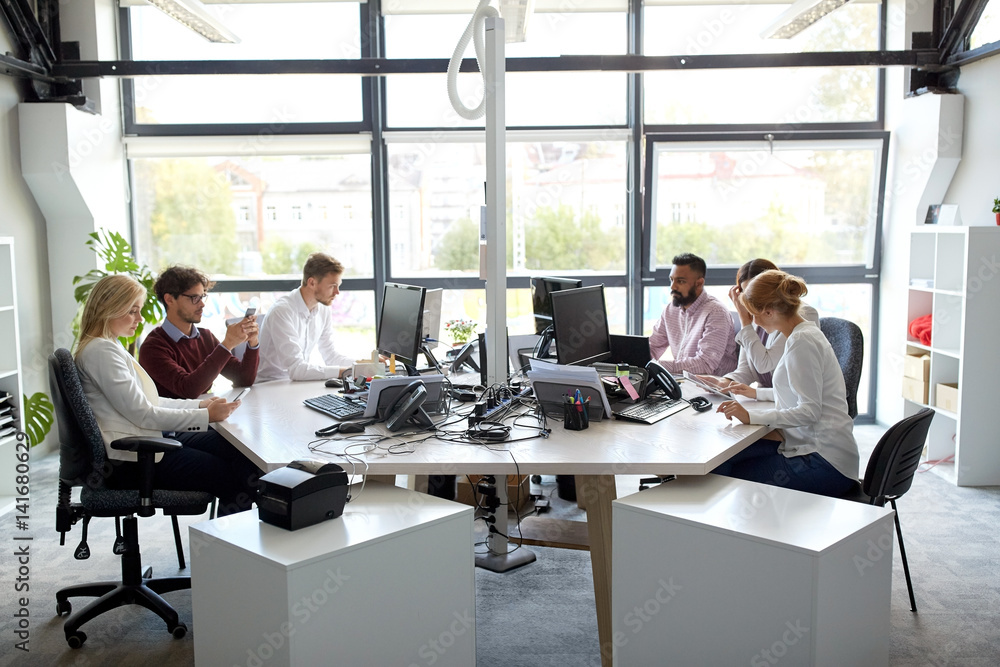 business team with computers working at office business team with computers working at office