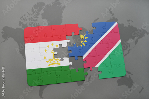 puzzle with the national flag of tajikistan and namibia on a world map