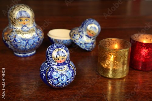 Traditional Russian dolls on wooden table