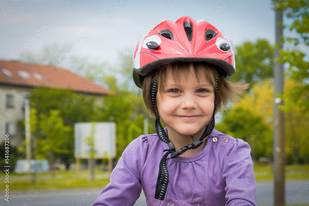 Fototapeta premium Little Girl Wear Sports Helmet