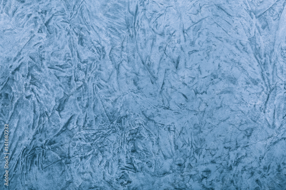 Blue painted canvas with crumpled texture Blue painted canvas with crumpled texture