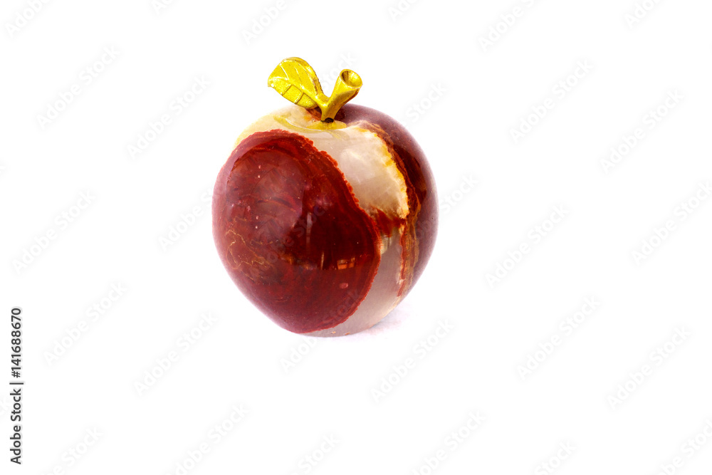 Apple made of onyx stone on a white background