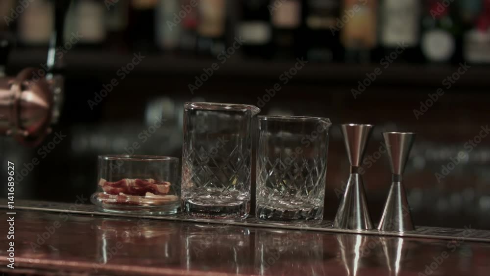 Empty glasses on wooden table in bar Empty glasses on wooden table in bar