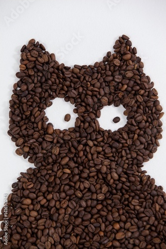Coffee beans forming owl