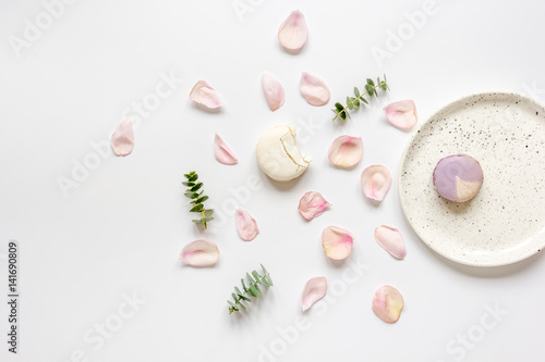 light breakfast disign with flowers on white table top view