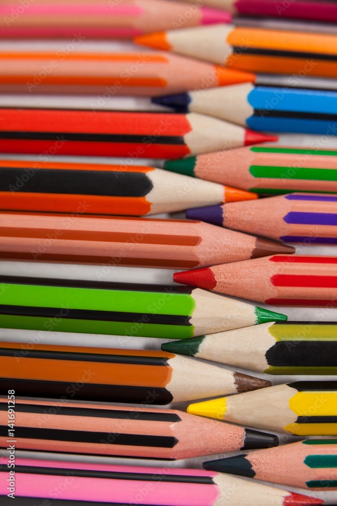 Colored pencils arranged in interlock pattern Colored pencils arranged in interlock pattern