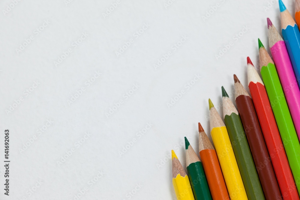 Fototapeta premium Colorful color pencil arranged in diagonal line