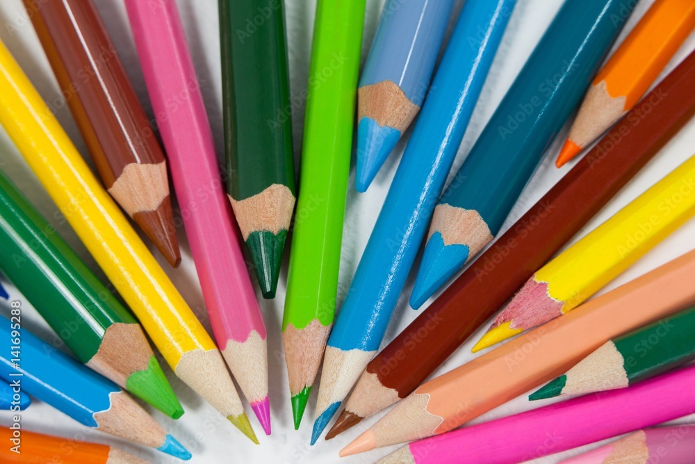 Multi colored pencils on white background Multi colored pencils on white background