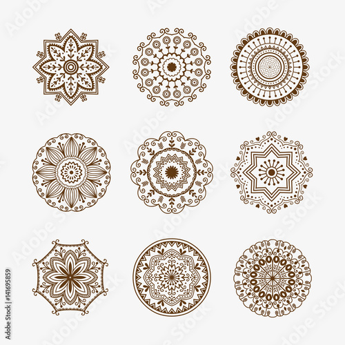 Henna tattoo brown mehndi flower template doodle ornamental lace decorative element and indian design pattern paisley arabesque mhendi embellishment vector. photo