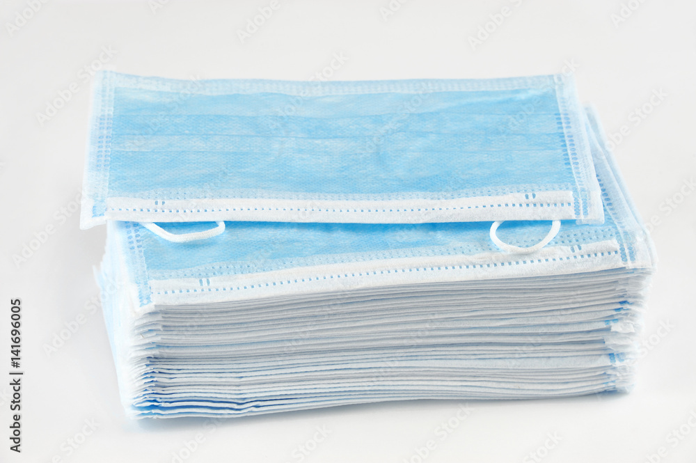 stack medical ear-loop mask isolated on white background stack medical ear-loop mask isolated on white background