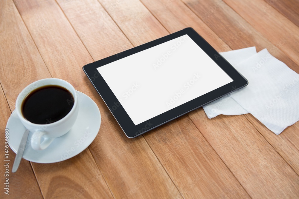 Coffee with digital tablet and paper Coffee with digital tablet and paper