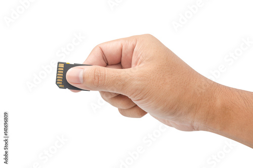 Hand with sd card isolated on white background