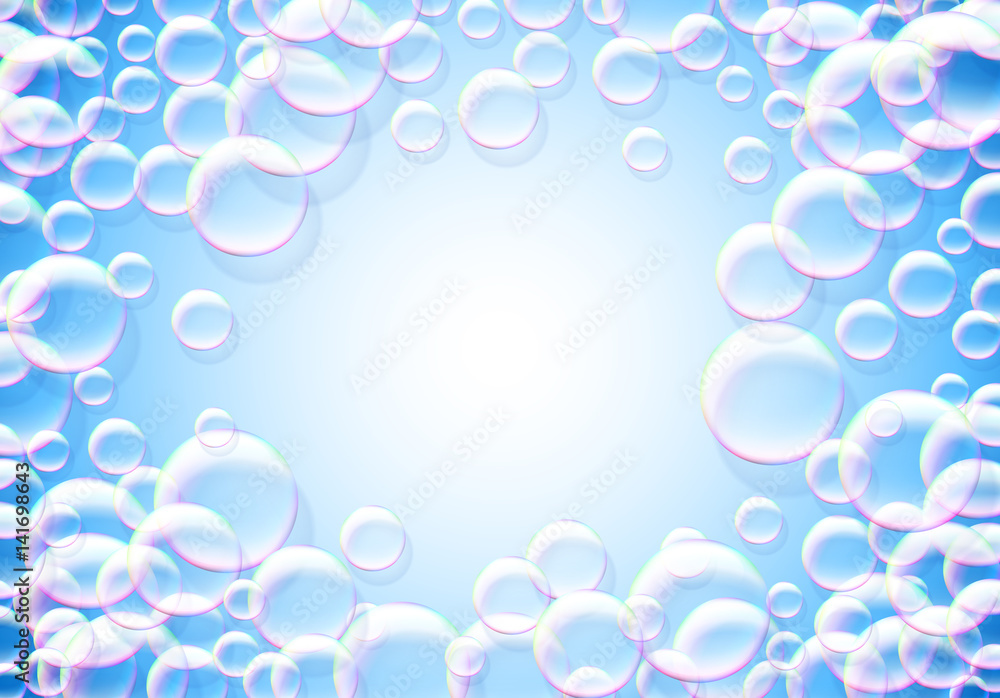 Soap bubbles abstract blue background with rainbow colored airy foam round frame