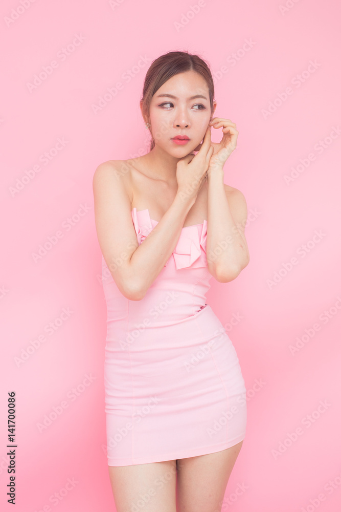 Korean woman fashion set sweet pink sexy girl, beauty and fashion concept., isolated with pink background. Korean woman fashion set sweet pink sexy girl, beauty and fashion concept., isolated with pink background.