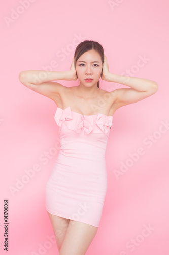 Korean woman fashion set sweet pink sexy girl  beauty and fashion concept.  isolated with pink background.