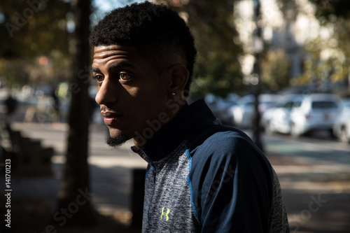 A portrait of a young man on an Autumn day in Central Park - NYC