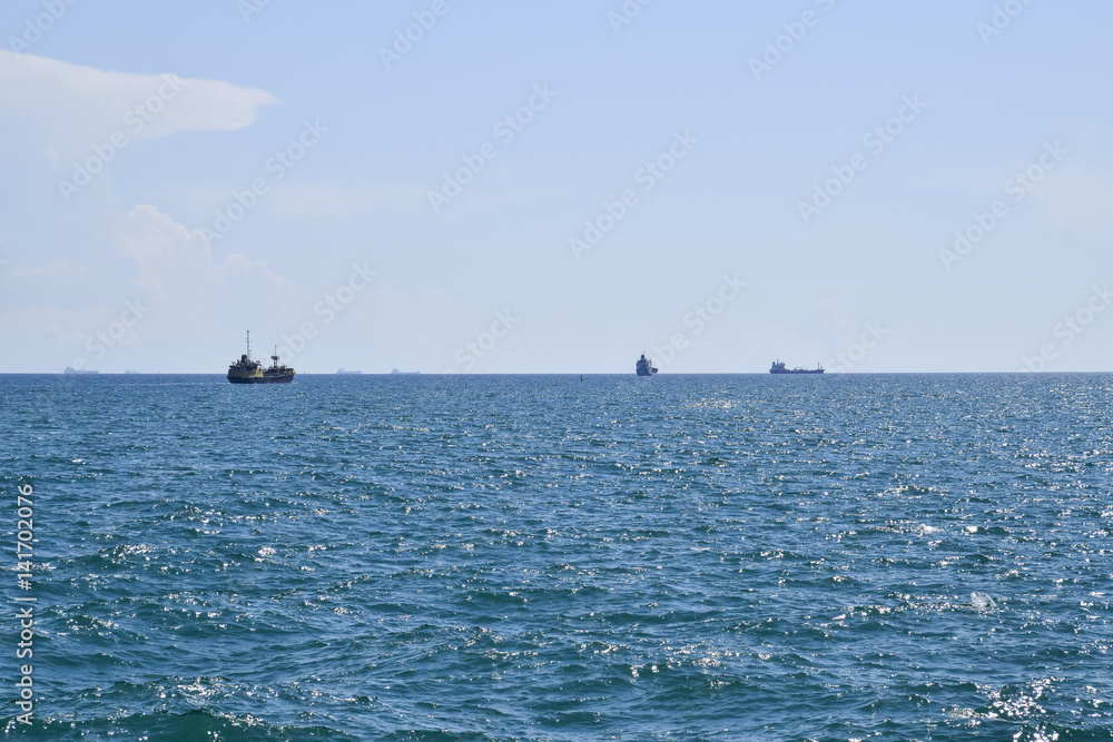 Ships on the horizon of the sea. Out at sea ships Ships on the horizon of the sea. Out at sea ships