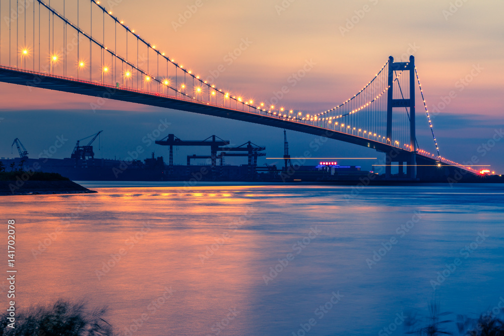 sunset view of cityscape along riverside,located in China. sunset view of cityscape along riverside,located in China.