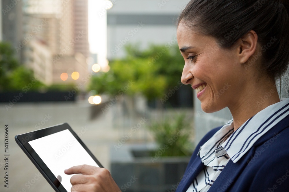 Business executive using digital tablet Business executive using digital tablet