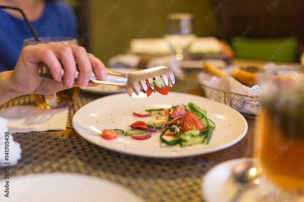 Dish with tomatoes and cucumbers in a restaurant