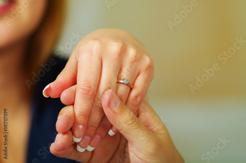 Close up shot of man  s hand holding a woman
