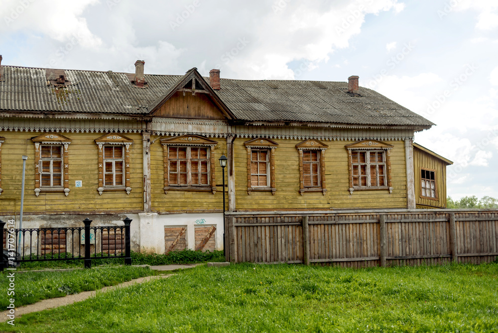 Old wooden rustic house a sunny summer day. Old wooden rustic house a sunny summer day.