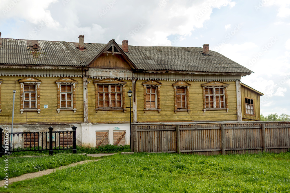 Old wooden rustic house a sunny summer day.