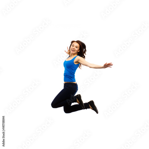 Young woman jumping isolated on white © Jacek Chabraszewski