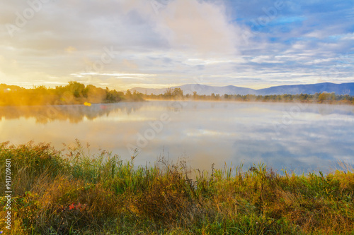 Lake in the mountains for recreation and fishing. Early morning © serg11111