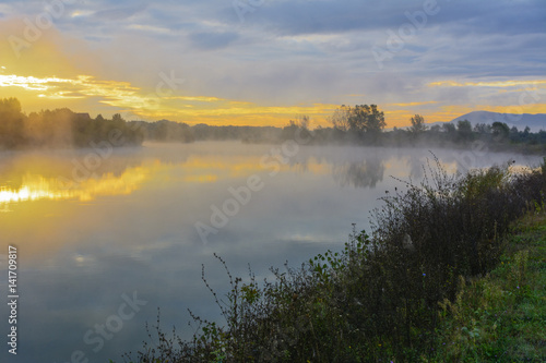 Lake in the mountains for recreation and fishing. Early morning