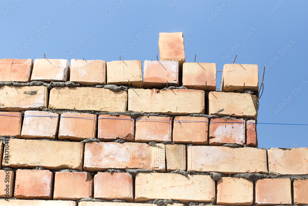 Obraz premium Brick wall on a construction site as a background