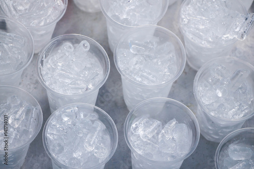 ice cubes in plastic cup