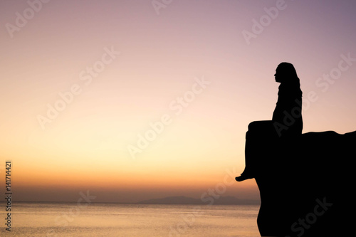 silhouette of lonely woman