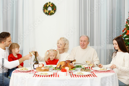 Happy family having Christm...