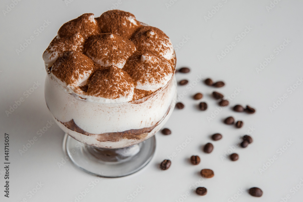 Delicious tiramisu and coffee beans Delicious tiramisu and coffee beans