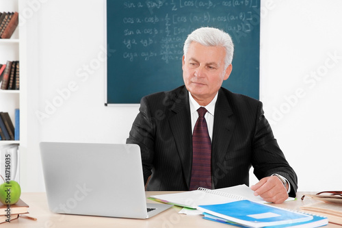 Senior teacher at lesson in...