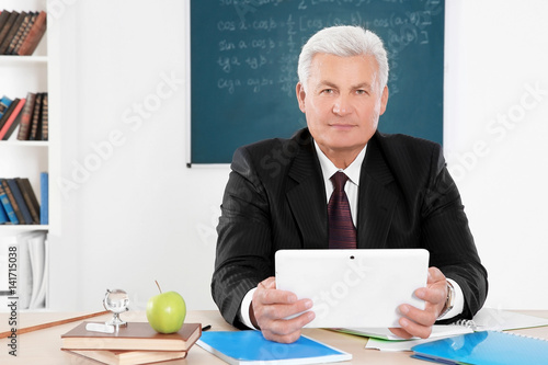 Senior teacher at lesson in...