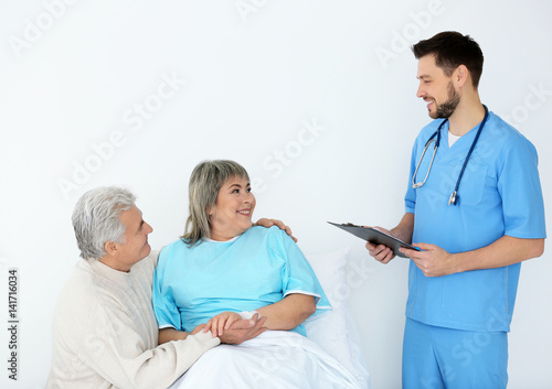 Senior man visiting wife in...