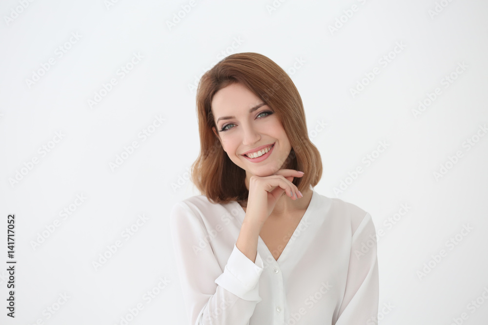 Young beautiful woman on white background Young beautiful woman on white background