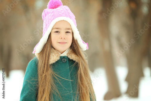 Pretty little girl walking ...