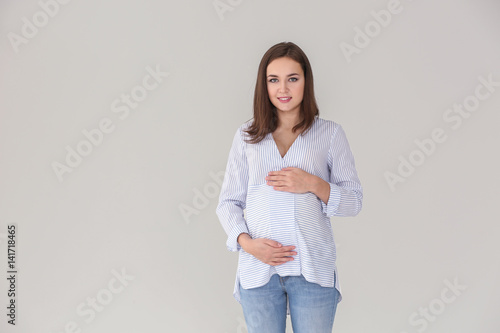 Beautiful pregnant woman on...