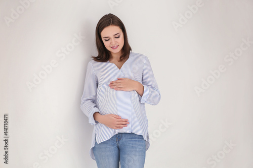Beautiful pregnant woman on...