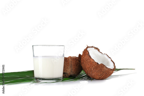 Composition with fresh coconut milk on white background
