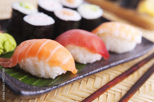 Various Japanese sushi on a plate, shallow depth of field